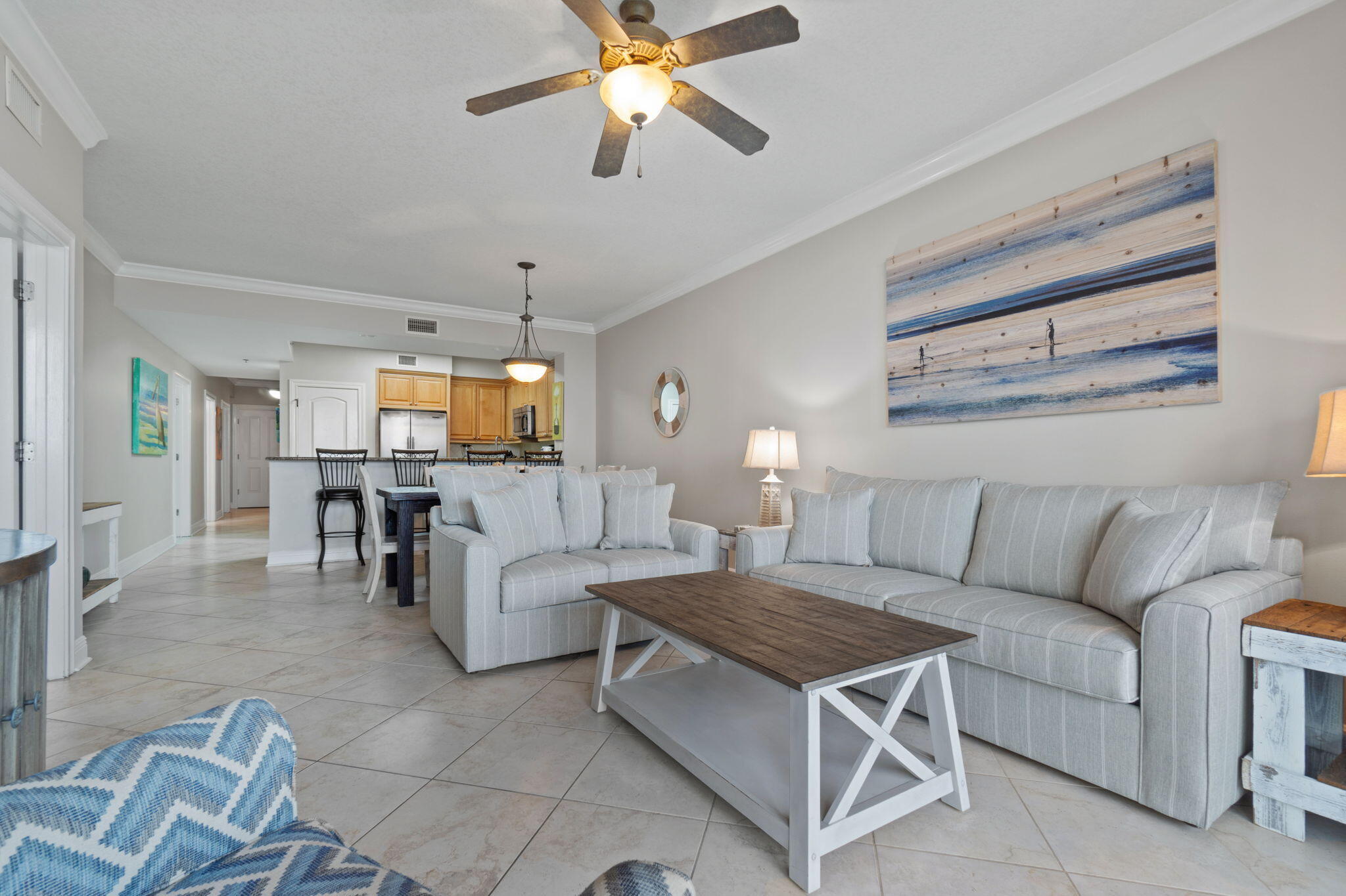 1150 Santa Rosa Boulevard, Unit 113 Fort Walton Beach, FL 32548 - Photo 11 of 71 a living room with furniture and a chandelier
