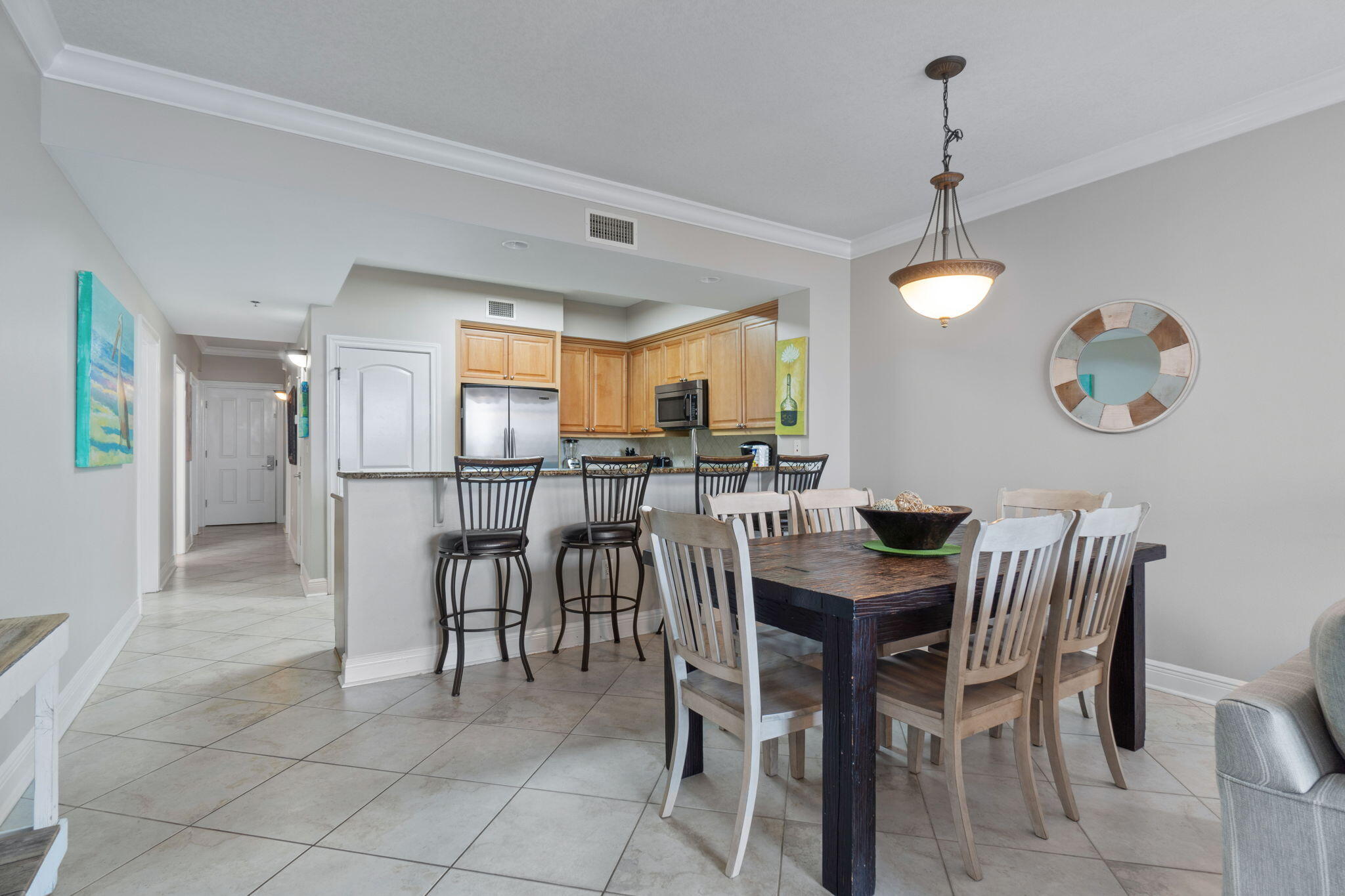 1150 Santa Rosa Boulevard, Unit 113 Fort Walton Beach, FL 32548 - Photo 13 of 71 a view of a dining room with furniture and a large window