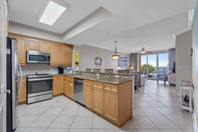 a kitchen with a stove and a microwave