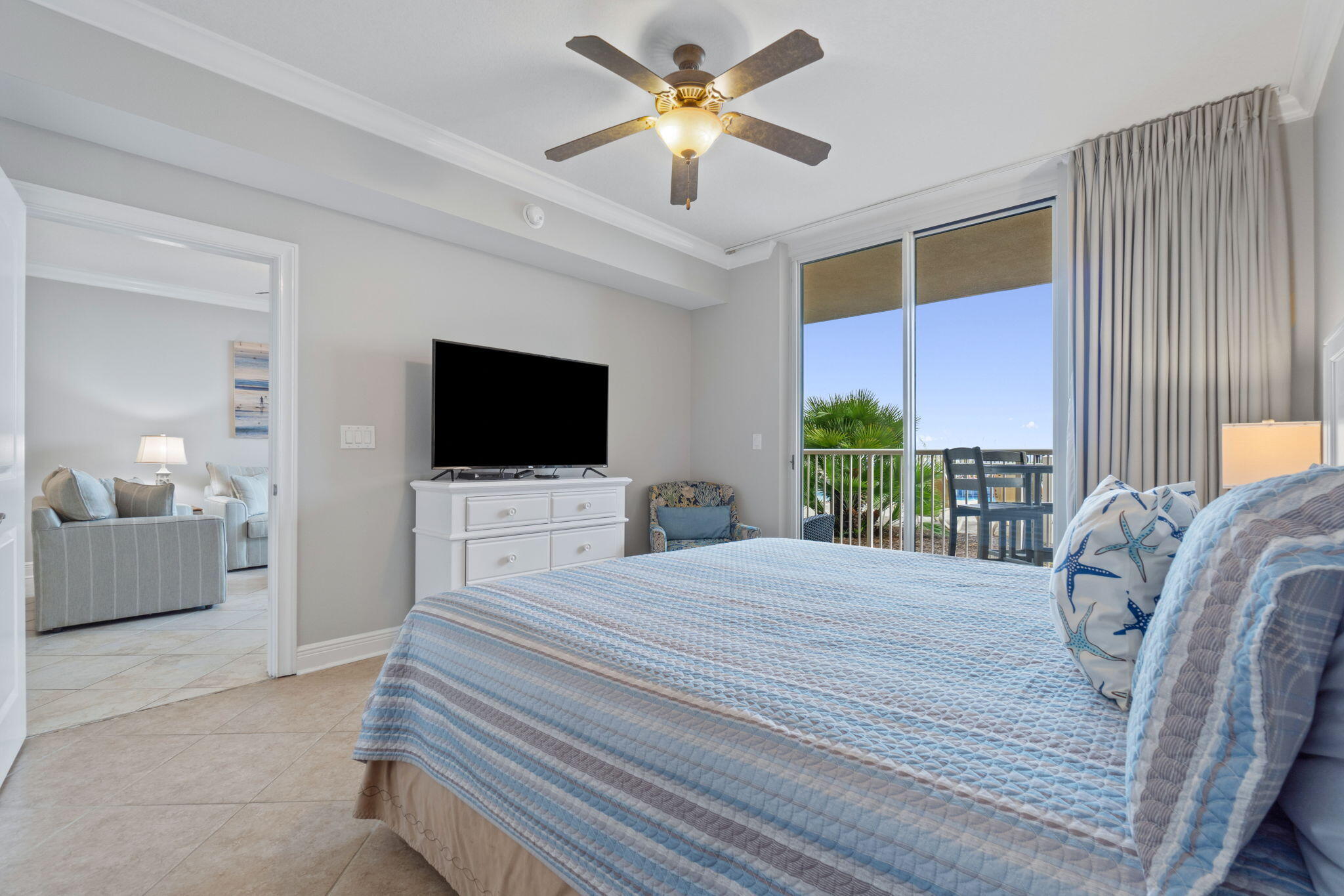 1150 Santa Rosa Boulevard, Unit 113 Fort Walton Beach, FL 32548 - Photo 25 of 71 a bedroom with a bed television on desk and a window