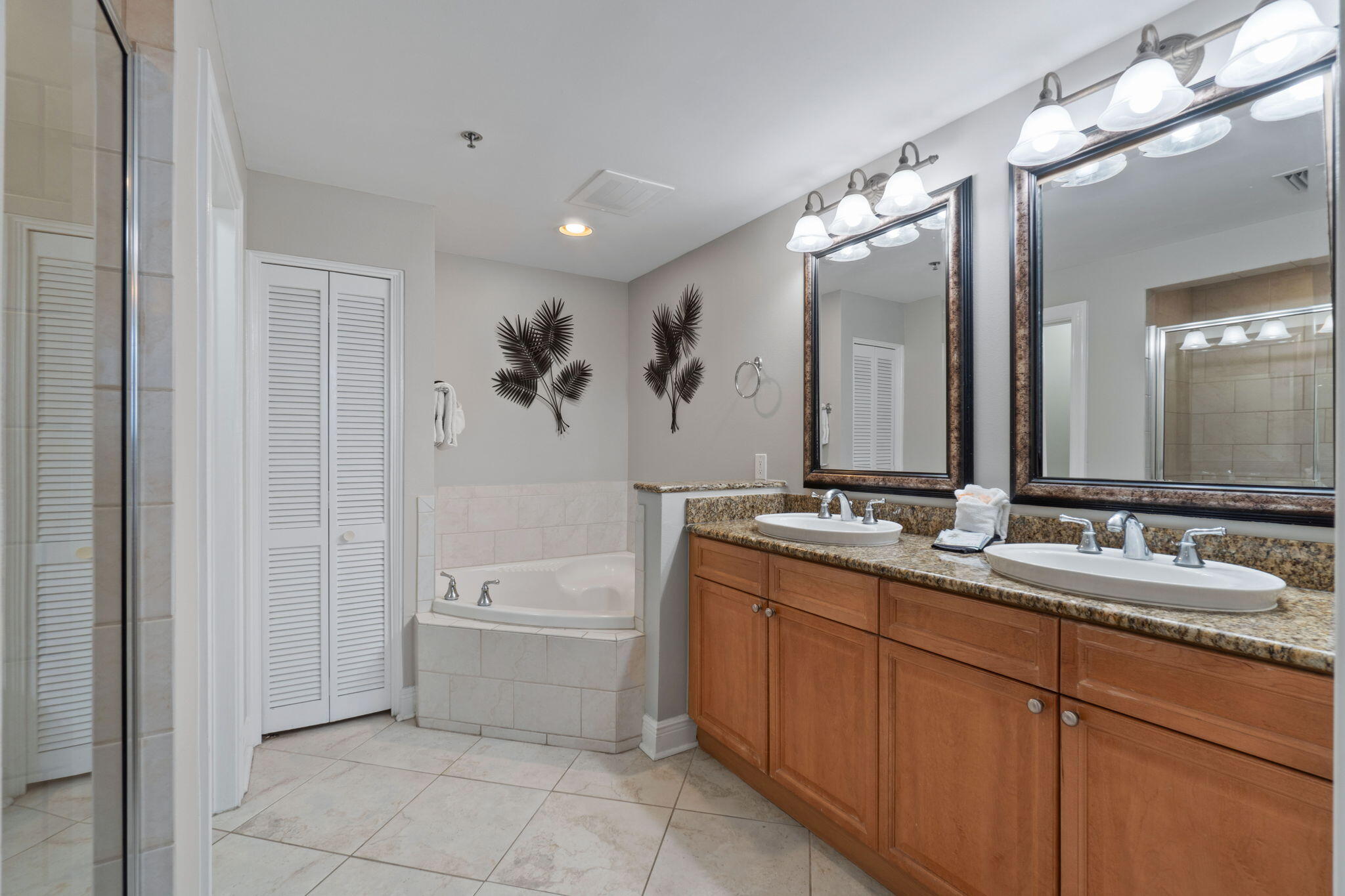 1150 Santa Rosa Boulevard, Unit 113 Fort Walton Beach, FL 32548 - Photo 30 of 71 a bathroom with a tub sink and mirror