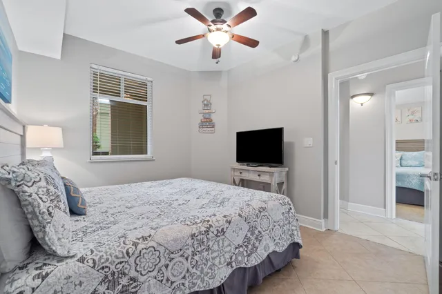 a bathroom with a shower a toilet and a shower