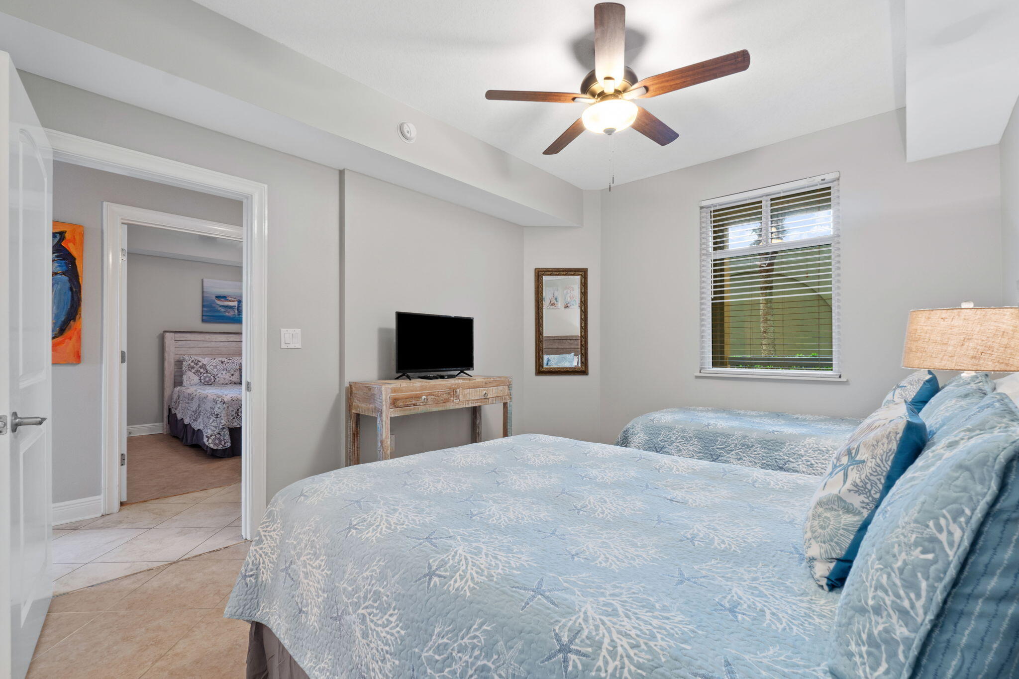 1150 Santa Rosa Boulevard, Unit 113 Fort Walton Beach, FL 32548 - Photo 41 of 71 a bedroom with a bed and a tv