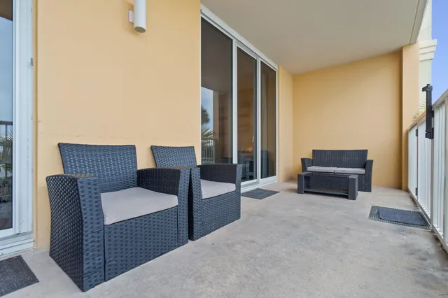 a view of a swimming pool with a lounge chair