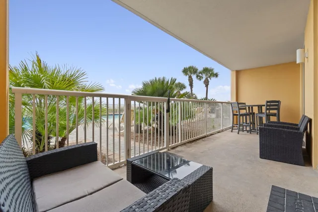 a view of a terrace with chairs
