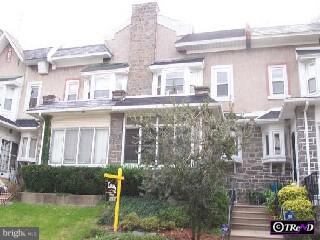 833 Marlyn Road Philadelphia, PA 19151 - Photo 1 of 1 a front view of a house with a yard