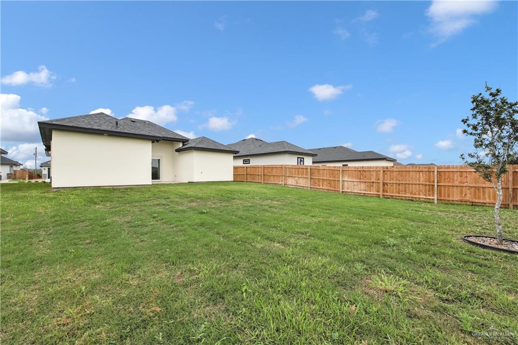 3516 East Alexa Street Edinburg, TX 78542 - Photo 4 of 25 a big yard with table and chairs