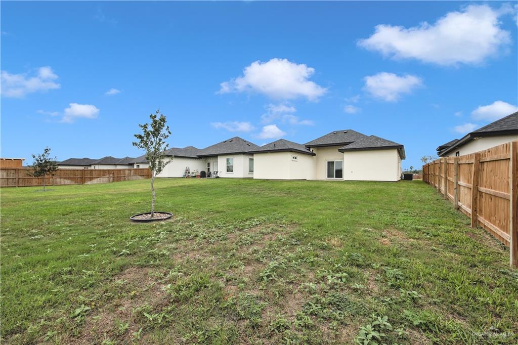 3516 East Alexa Street Edinburg, TX 78542 - Photo 5 of 25 a view of a house with a yard