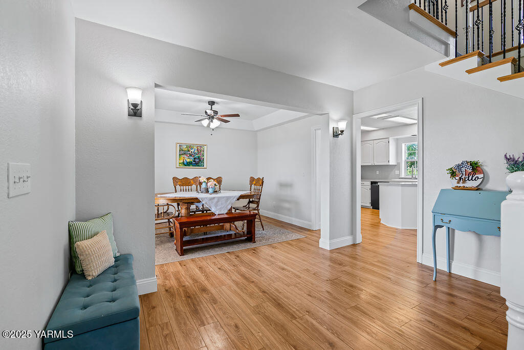 11809 Occidental Road Yakima, WA 98908 - Photo 11 of 60 a bedroom with furniture and a wooden floor