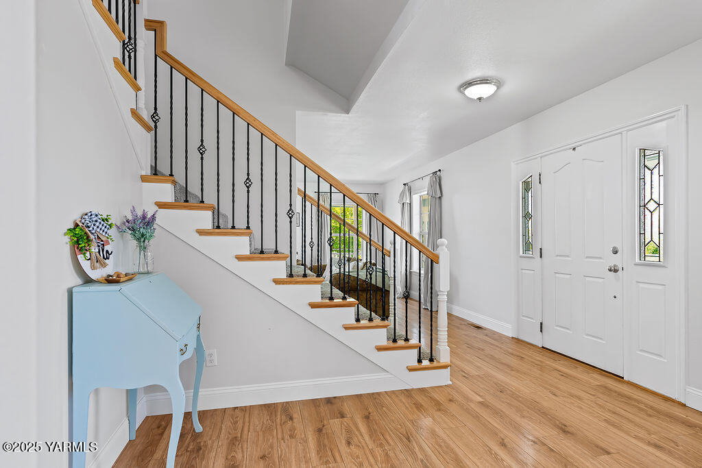 11809 Occidental Road Yakima, WA 98908 - Photo 12 of 60 a view of entryway and hall with wooden floor