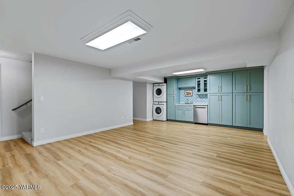 11809 Occidental Road Yakima, WA 98908 - Photo 39 of 60 a view of a kitchen with a sink and a stove