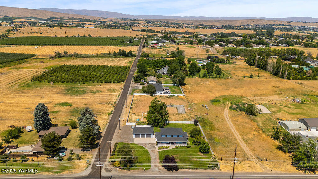 11809 Occidental Road Yakima, WA 98908 - Photo 60 of 60 an aerial view of residential houses with outdoor space
