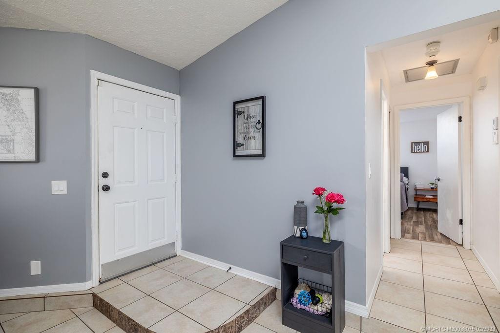 6803 Salerno Road Fort Pierce, FL 34951 - Photo 37 of 65 a view of livingroom with furniture and wooden floor