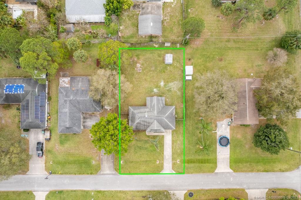 6803 Salerno Road Fort Pierce, FL 34951 - Photo 54 of 65 front view of a brick house
