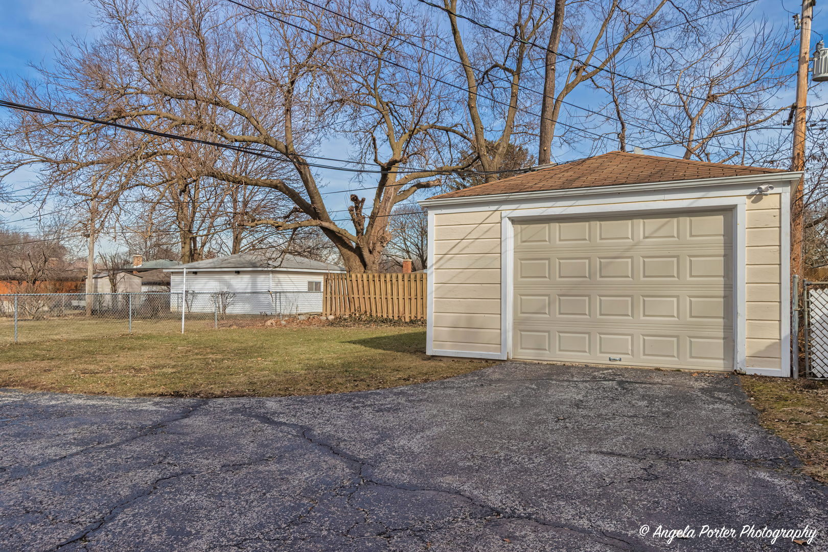 238 Woodland Road Libertyville, IL 60048 - Photo 17 of 19 a view of a house with a yard and garage