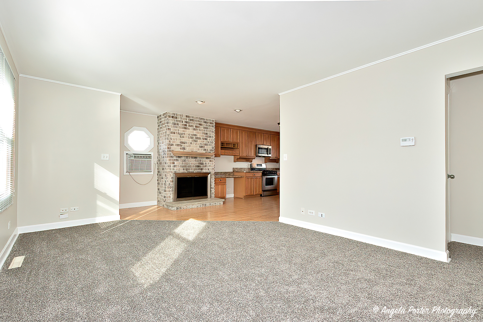 238 Woodland Road Libertyville, IL 60048 - Photo 2 of 19 a view of a kitchen with a sink and a refrigerator