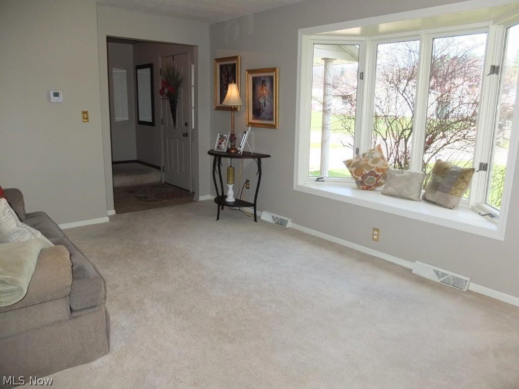 1310 Bravado Road Southwest Canton, OH 44706 - Photo 2 of 23 Formal living room with bay window.