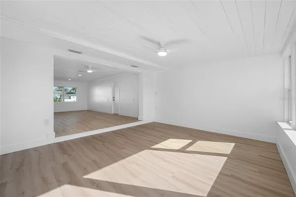 a bathroom with a sink vanity and mirror