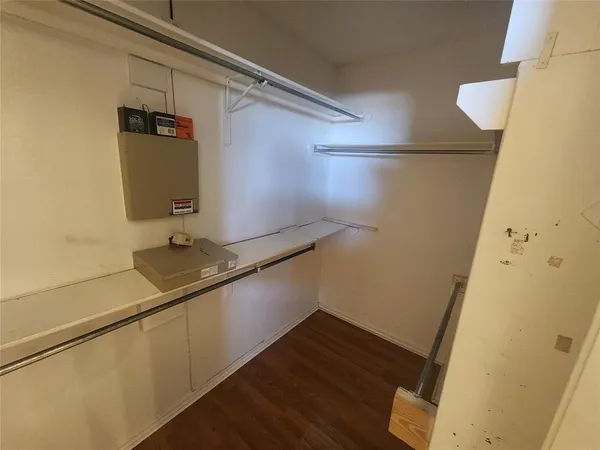 a bathroom with a double vanity sink toilet and shower