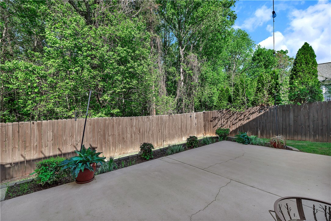 101 Riviera Circle Anderson, SC 29621 - Photo 27 of 35 This private outdoor space features a well-maintained fence and a spacious concrete patio.