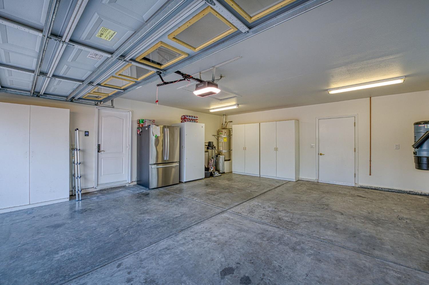 15640 North Friant Road Friant, CA 93626 - Photo 67 of 67 oversized 2 car garage, new door and garage door opener