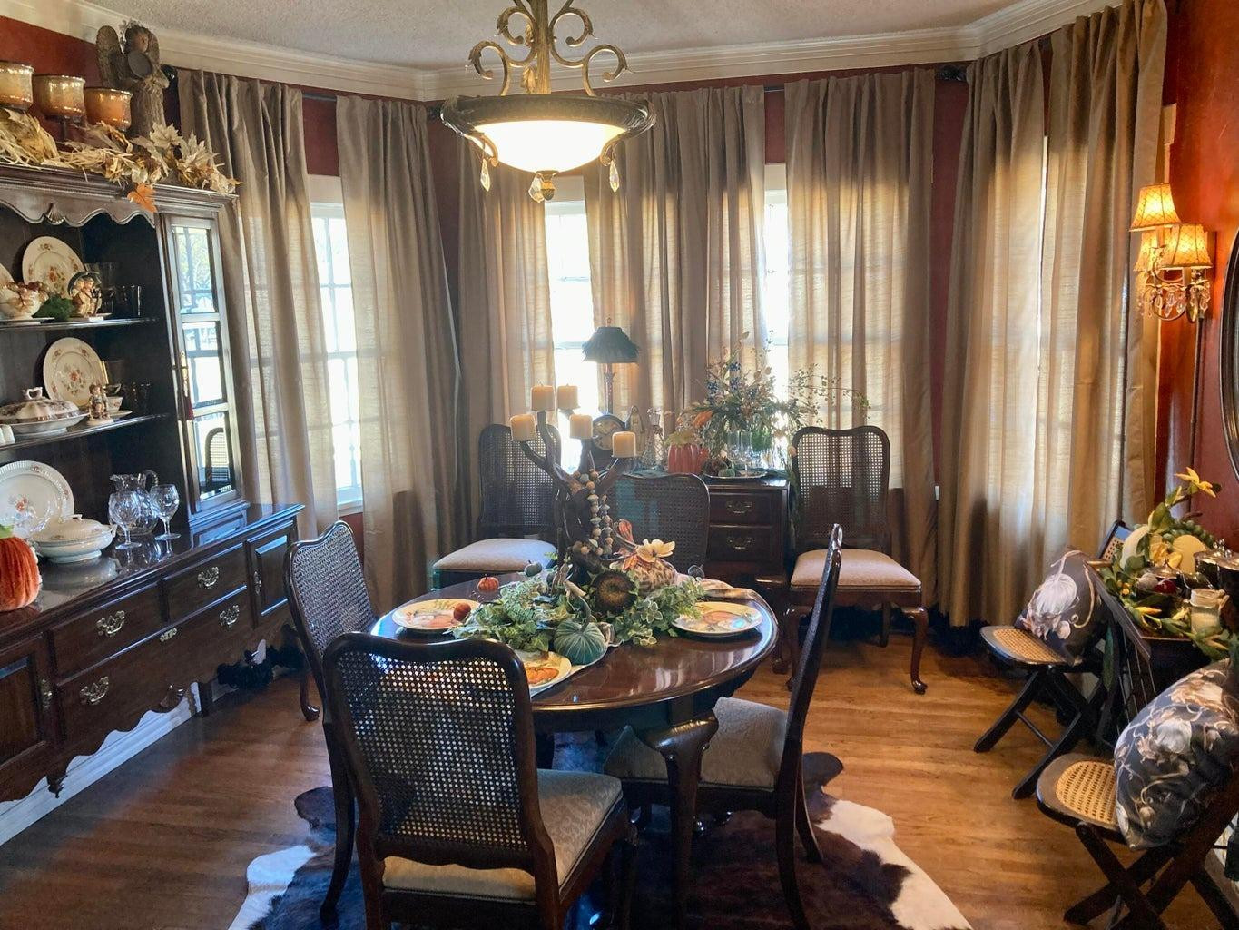 715 Denver Plainview, TX 79072 - Photo 14 of 45 a view of a dining room with furniture and window