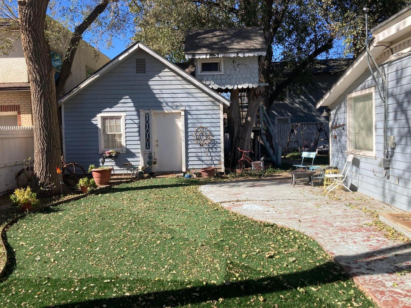 715 Denver Plainview, TX 79072 - Photo 3 of 45 a view of a house with yard and sitting area