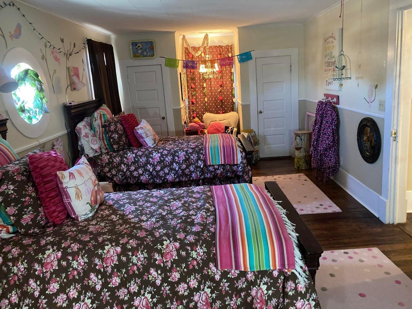 715 Denver Plainview, TX 79072 - Photo 32 of 45 a living room filled with furniture and a flat screen tv