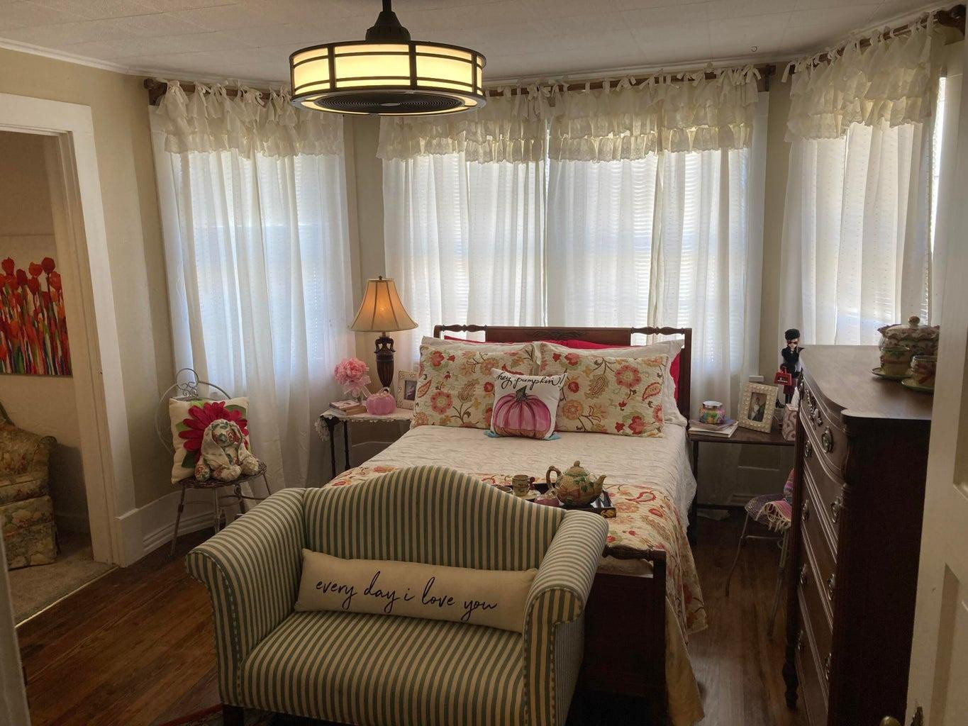 715 Denver Plainview, TX 79072 - Photo 33 of 45 a bed room with a bed and a couch