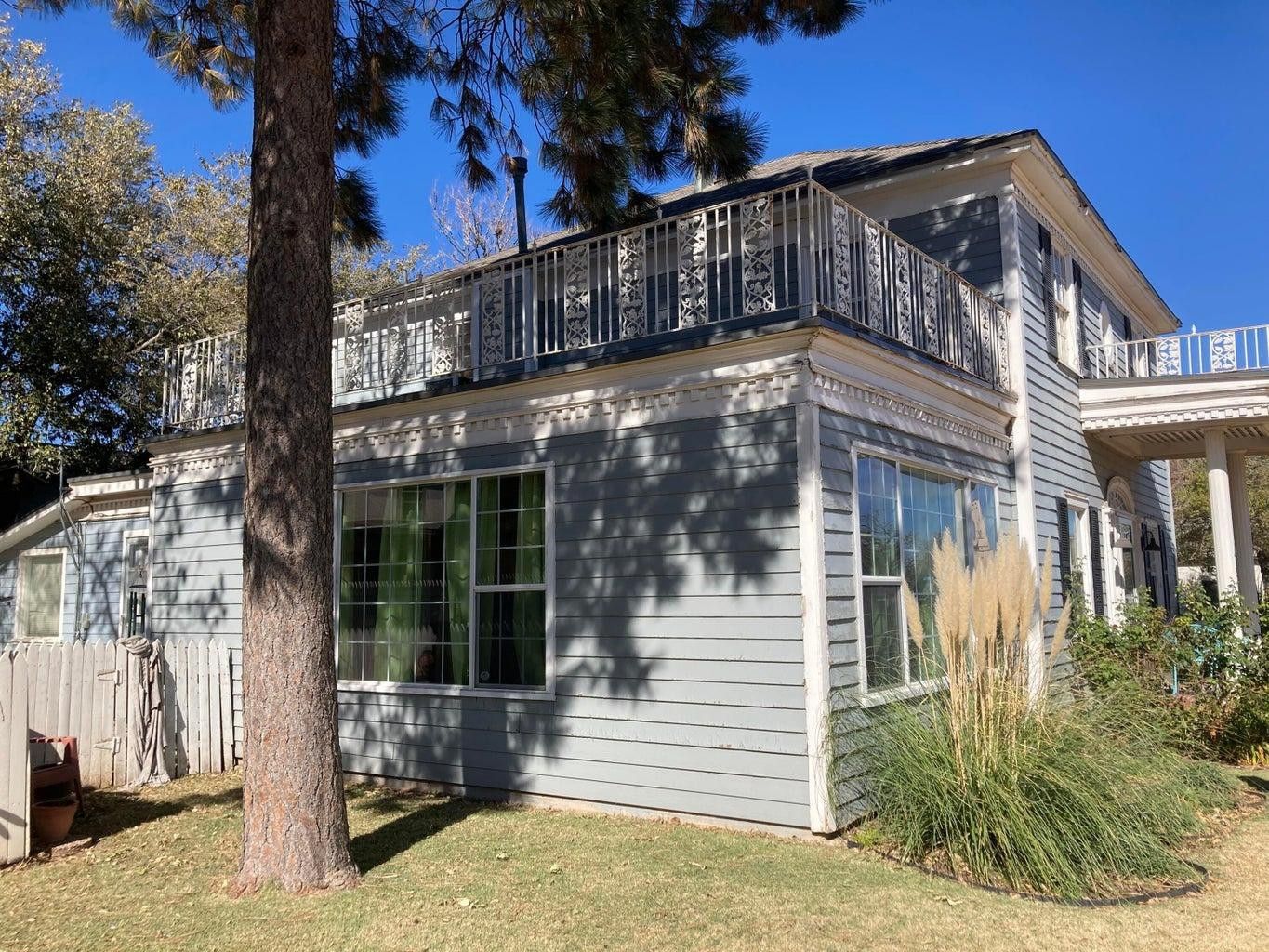 715 Denver Plainview, TX 79072 - Photo 5 of 45 a view of a building with a yard