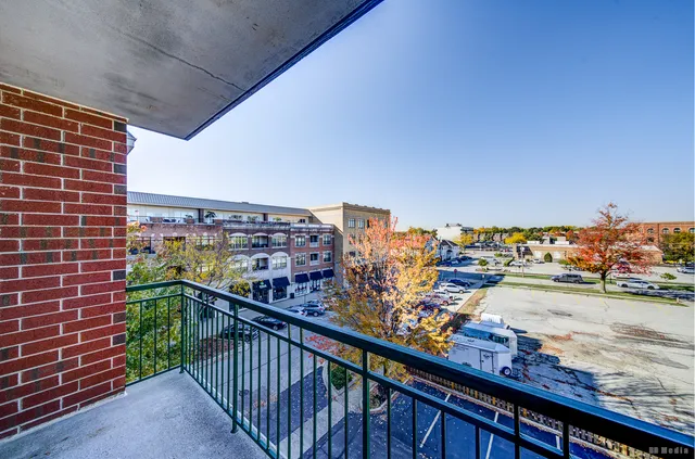 a view of a balcony with an ocean view