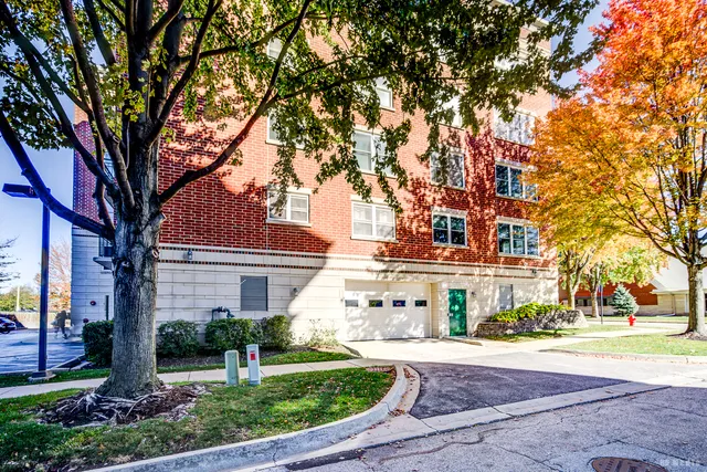a view of a building with trees