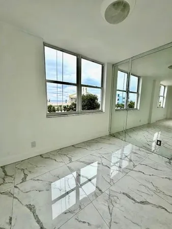 a bathroom with a sink and a shower