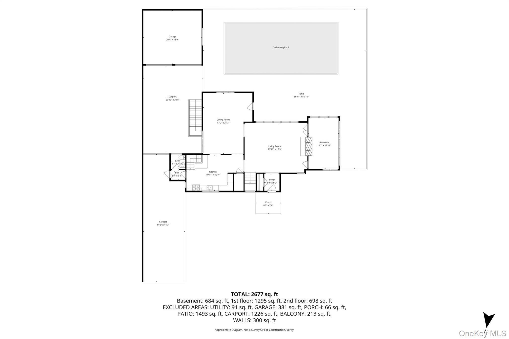 216 Beverly Road Queens, NY 11363 - Photo 45 of 50 a picture of a room with a white wall and a refrigerator