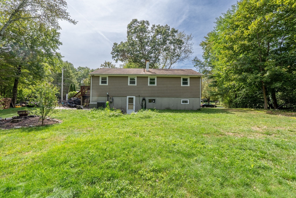 8 Governor Fuller Road Billerica, MA 01821 - Photo 6 of 33 a view of a house with yard and a garden