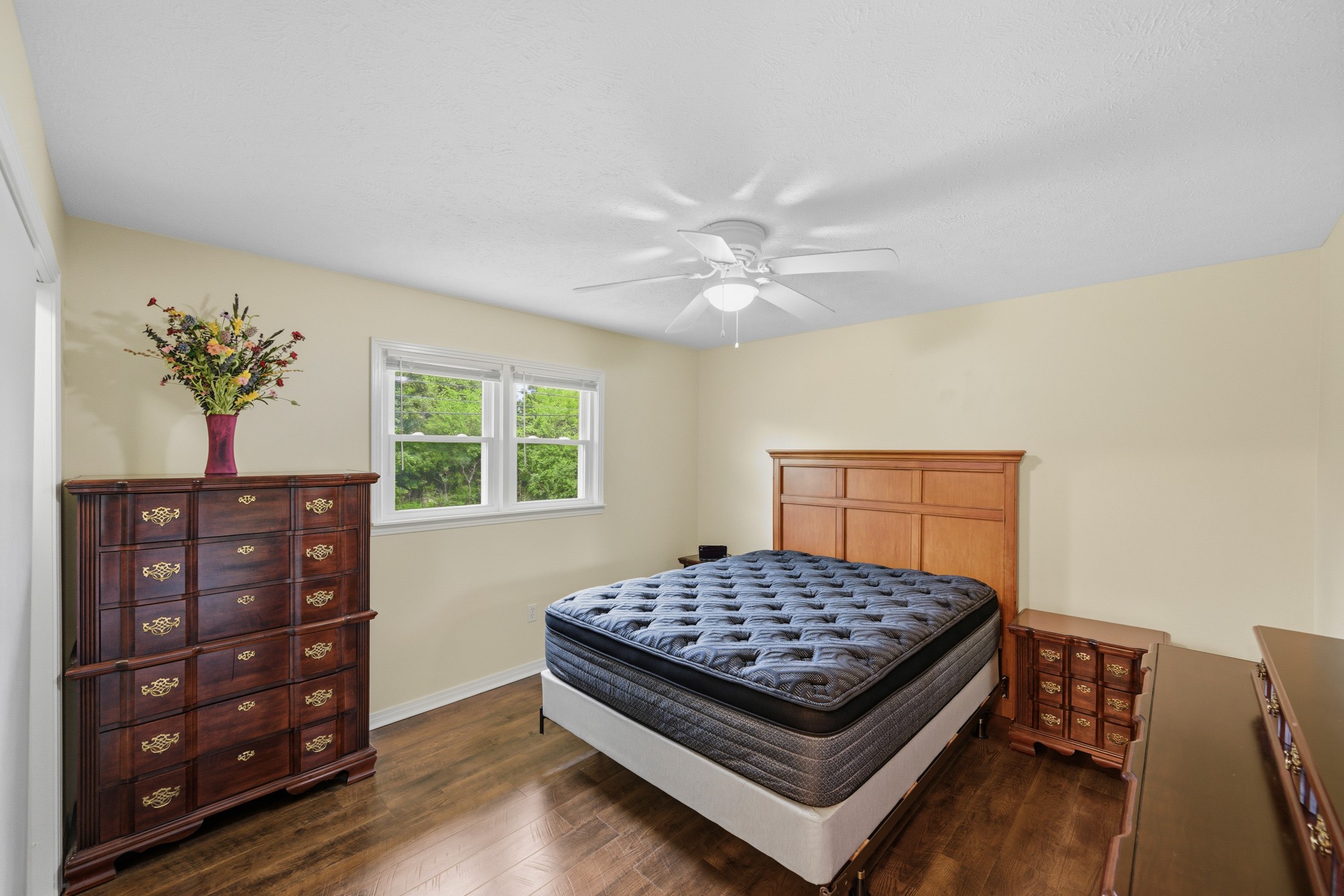 944 Brooksie Thompson Road Decaturville, TN 38329 - Photo 11 of 47 a bedroom with a bed and a window