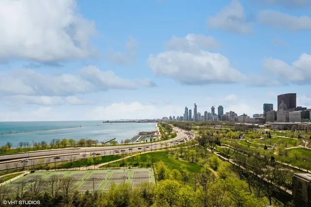 a view of a city with lots of buildings in the background