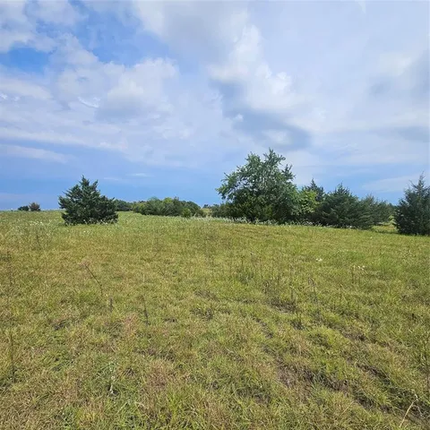 a view of a lake with a city