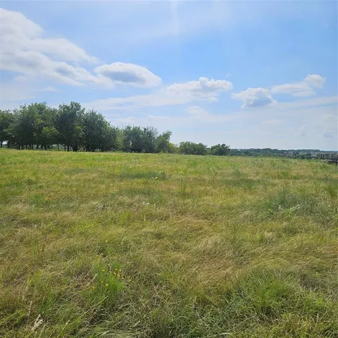 a view of an ocean and mountain