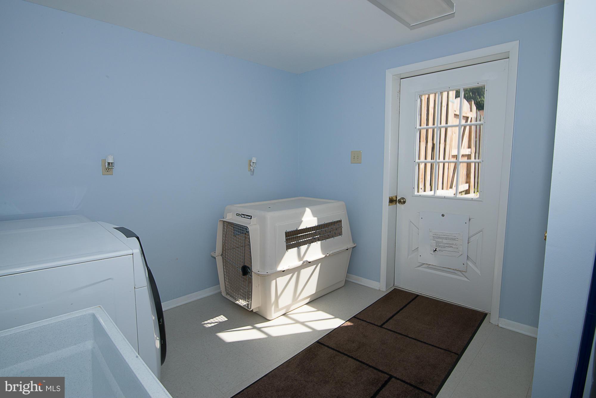 7314 Elgar Street Springfield, VA 22151 - Photo 22 of 30 Large Laundry/ Mud room that open to outdoors