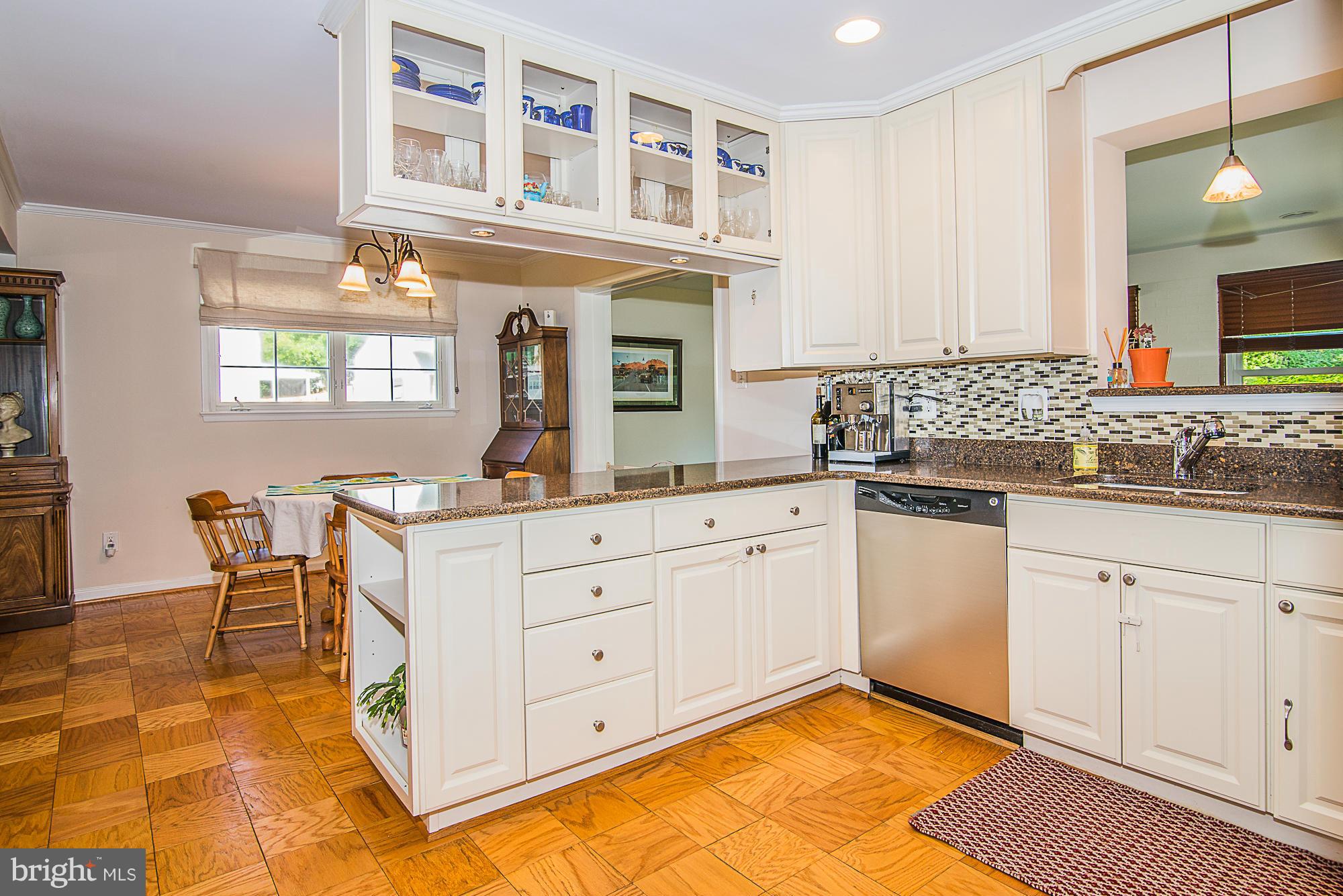 7314 Elgar Street Springfield, VA 22151 - Photo 10 of 30 Kitchen overlooks sun filled dining room