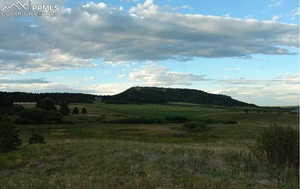 15410 South Perry Park Road Larkspur, CO 80118 - Photo 2 of 28 a view of an ocean and mountain