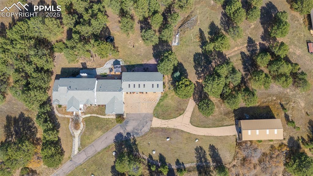 15410 South Perry Park Road Larkspur, CO 80118 - Photo 24 of 28 an aerial view of residential houses with outdoor space
