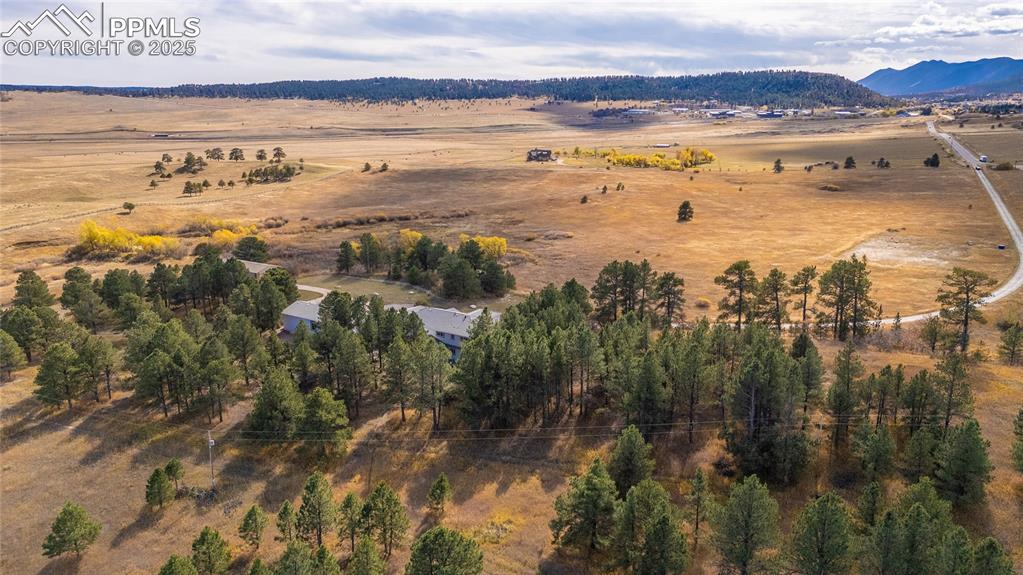 15410 South Perry Park Road Larkspur, CO 80118 - Photo 28 of 28 a view of an ocean and a mountain
