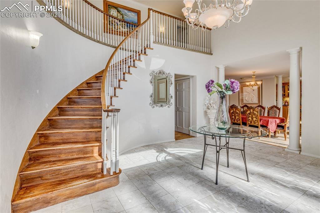 15410 South Perry Park Road Larkspur, CO 80118 - Photo 5 of 28 a view of entryway and hall