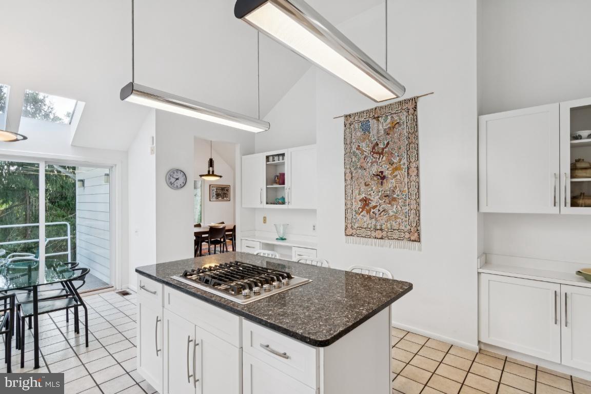 2102 South Road Baltimore, MD 21209 - Photo 11 of 37 a stove top oven sitting inside of a kitchen