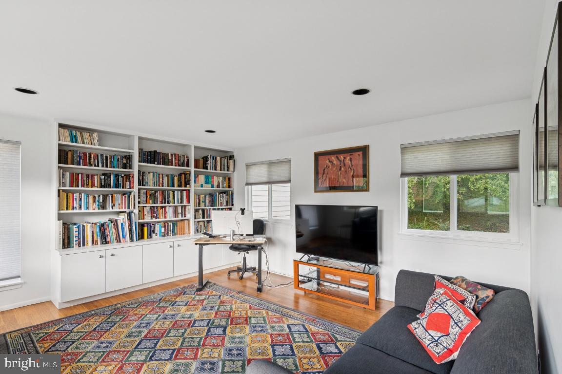 2102 South Road Baltimore, MD 21209 - Photo 13 of 37 a living room with furniture and a flat screen tv