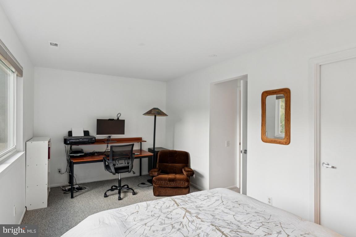 2102 South Road Baltimore, MD 21209 - Photo 26 of 37 a bedroom with a workspace