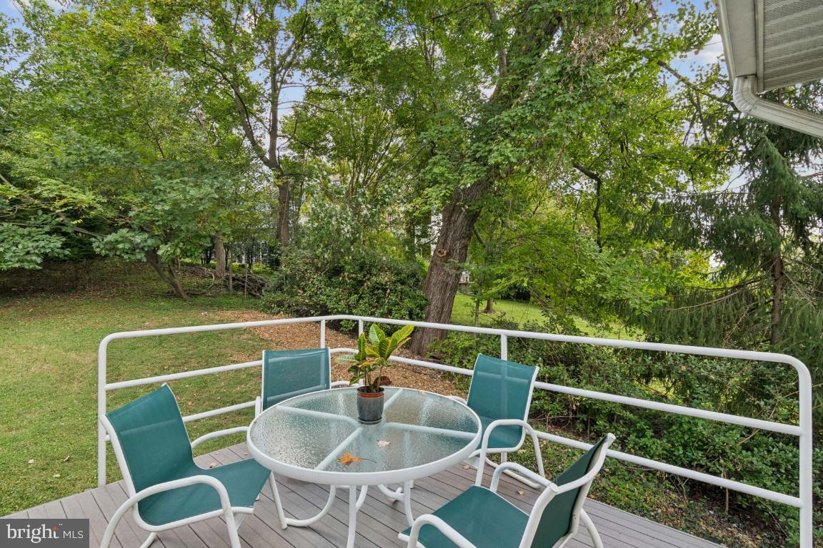 2102 South Road Baltimore, MD 21209 - Photo 31 of 37 a balcony with table and chairs