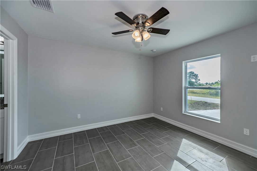 9024 Largo Circle LaBelle, FL 33935 - Photo 16 of 27 an empty room with a window
